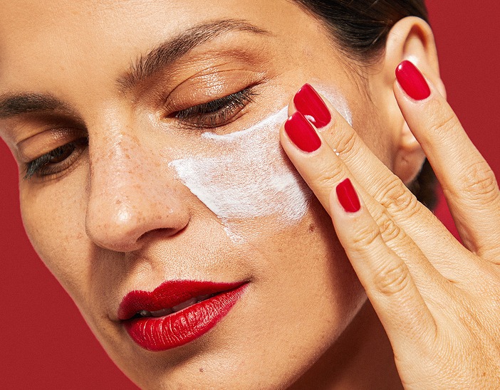 O Cosmedics Mineral Pro being applied to a woman's face